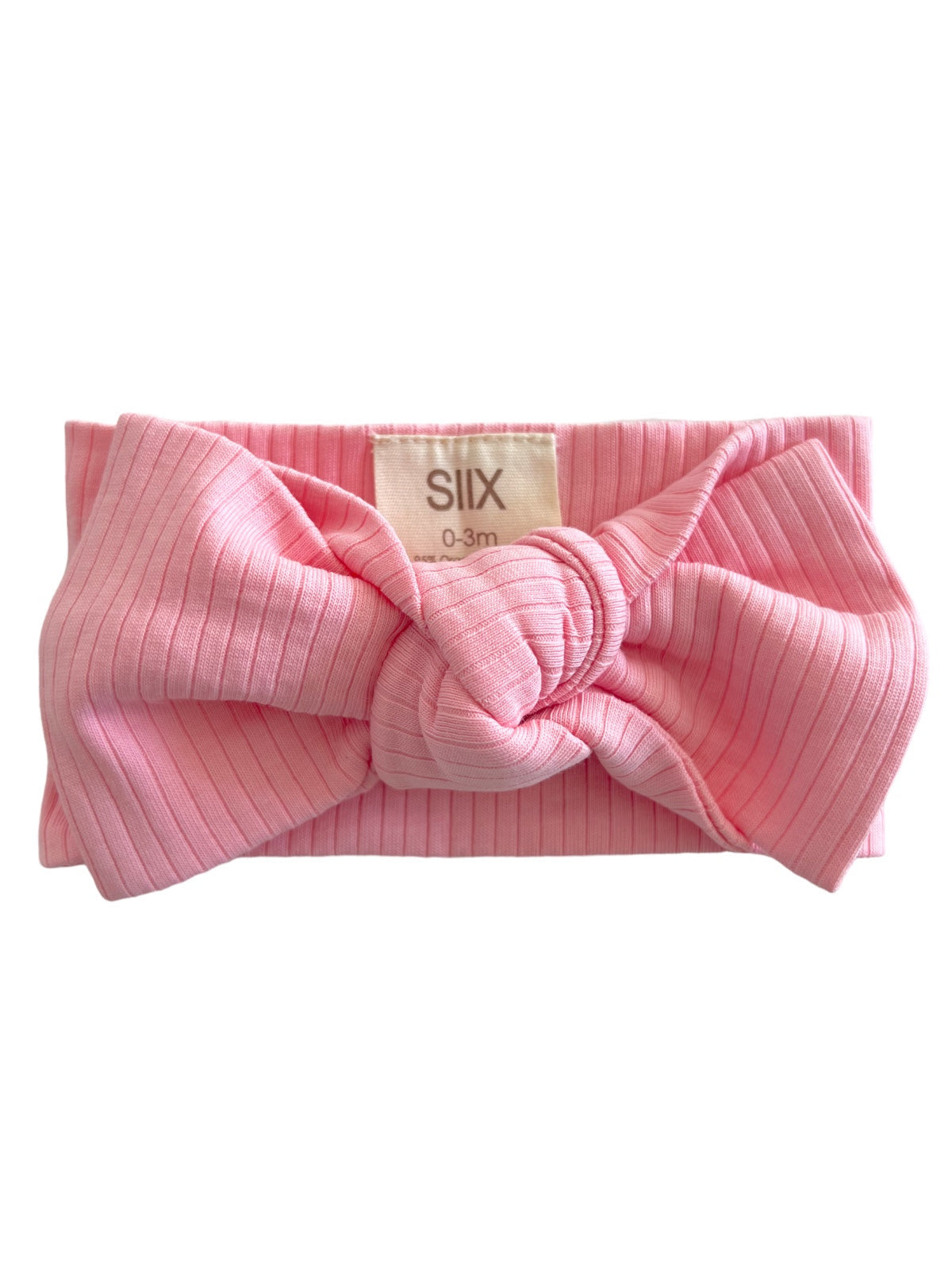 Pink striped infant headband with a large knot, labeled for ages 0-3 months.