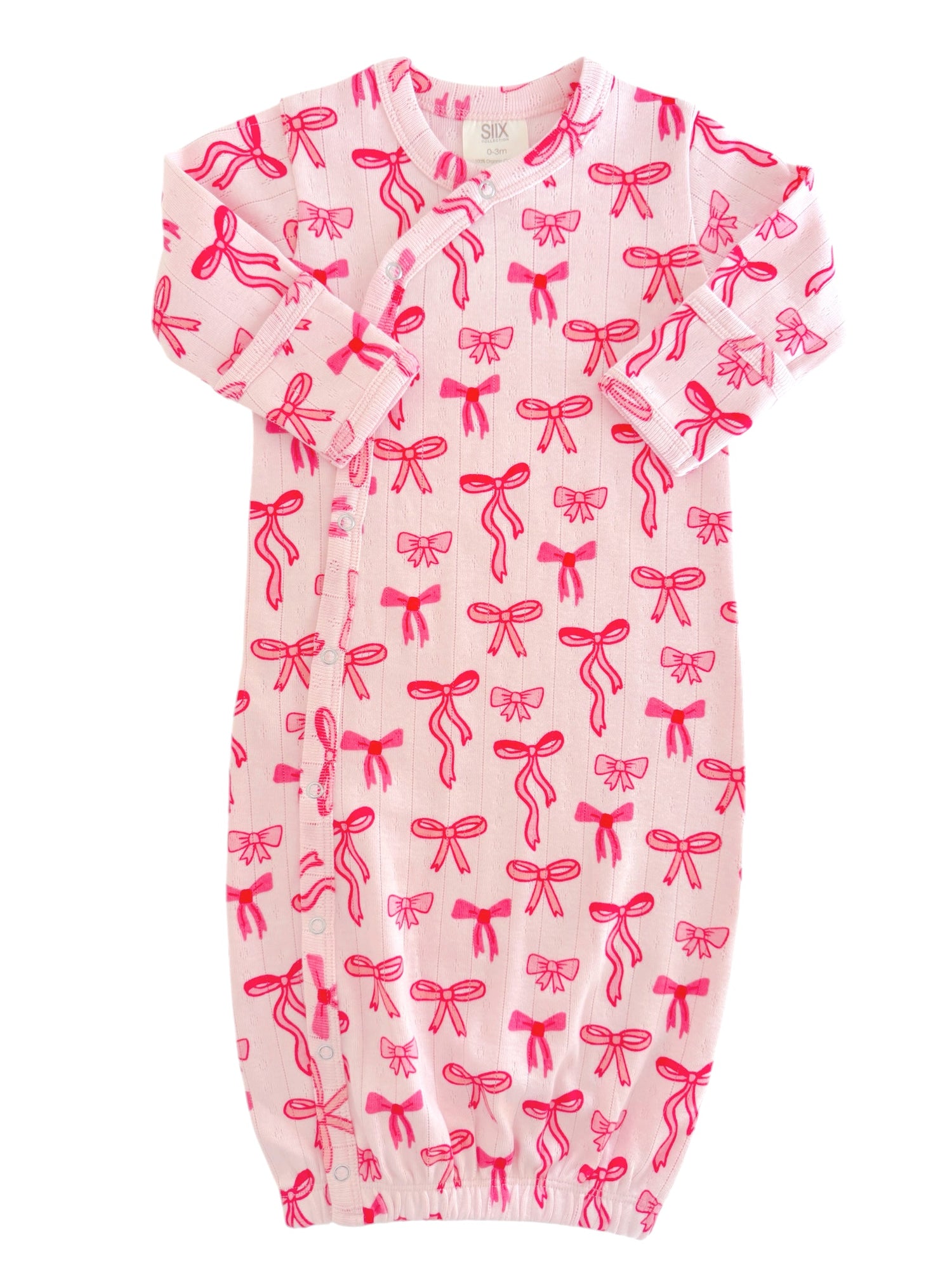 Light pink baby gown with red bow patterns, featuring short sleeves and a gathered bottom.
