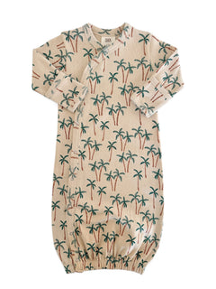 Baby sleep sack featuring a palm tree print on a light background, soft fabric, and snap closure design.