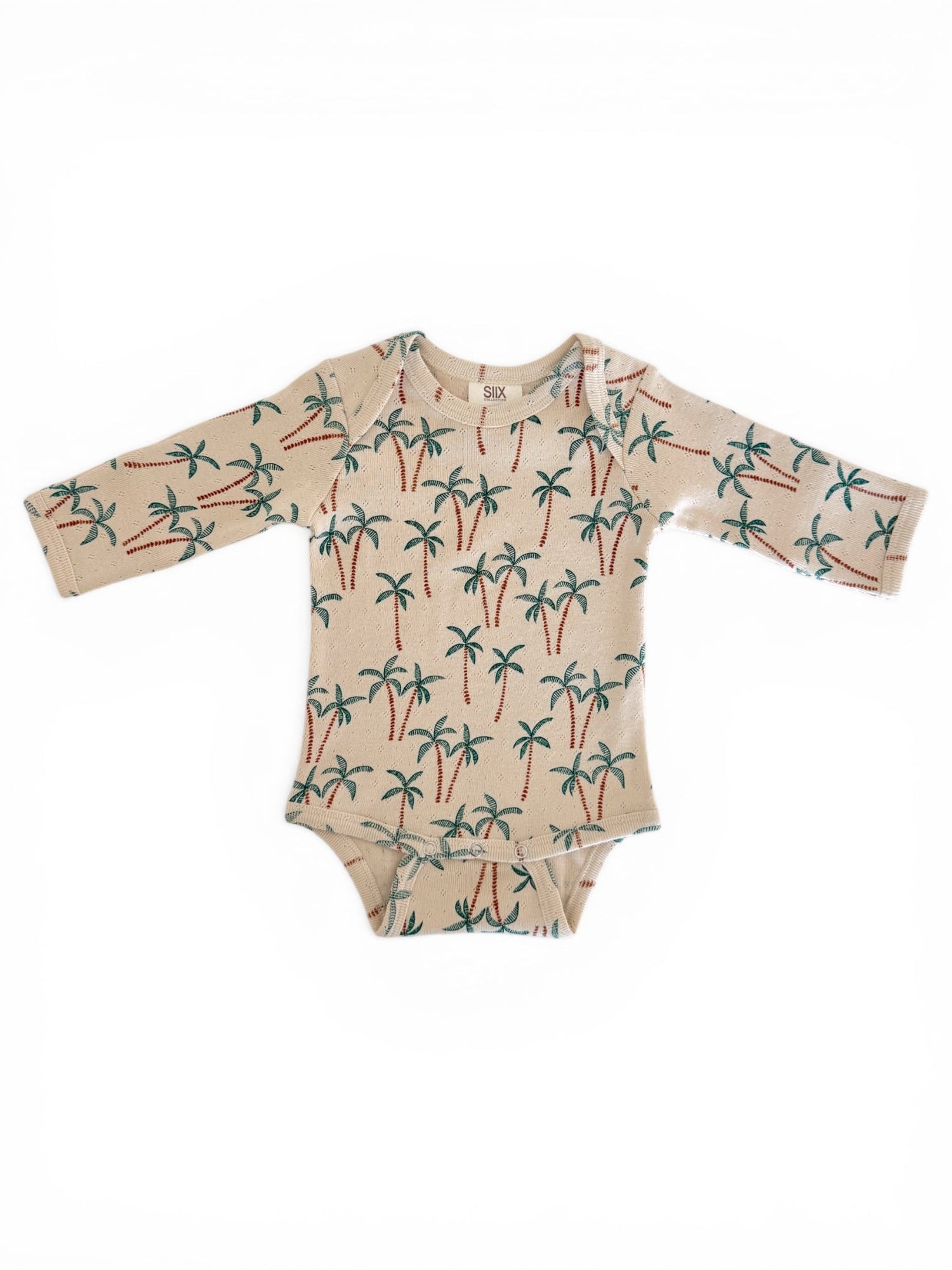 Beige long-sleeve onesie with a colorful palm tree print, suitable for infants.