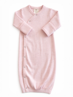 Pink gingham newborn sleep sack with long sleeves and snaps down the side for easy dressing.