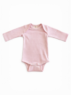 Pink long-sleeve baby bodysuit with a checked pattern, featuring snap buttons at the bottom.