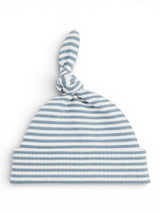 Striped blue and white baby hat with a knot on top, designed for comfort and style.