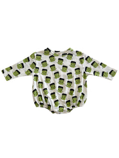 White long-sleeved infant bodysuit with a green Frankenstein face pattern.