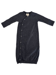 Black long-sleeve baby gown with snaps, featuring a soft textured knit design. Ideal for comfort and easy dressing.