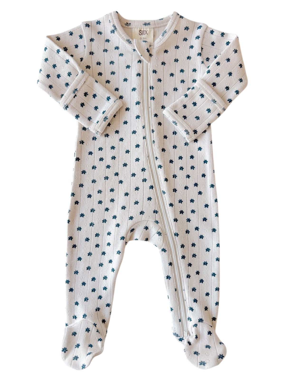 White infant onesie with blue floral patterns and long sleeves, featuring a front zipper and footed design.
