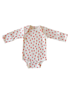 White baby onesie with red strawberry print and long sleeves. Ideal for infants and toddlers.