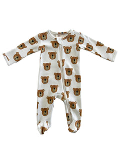 White baby onesie with bear face prints, featuring long sleeves and a zipper front closure.