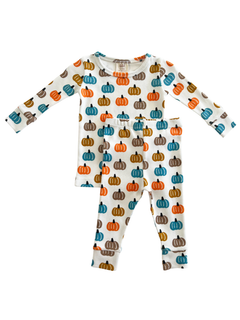 Colorful pumpkin-patterned toddler pajama set featuring a long-sleeve top and matching pants.