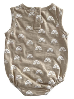Tan baby romper with white rainbow prints, featuring a button closure at the back and elasticized leg openings.