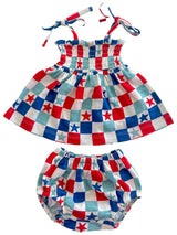 Red, white, and blue checkered toddler dress with matching bloomer shorts featuring stars. Ideal for summer events.