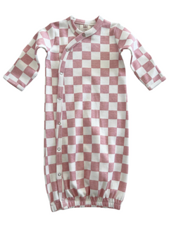 Pink and white checkered infant sleep sack with button closure and long sleeves.