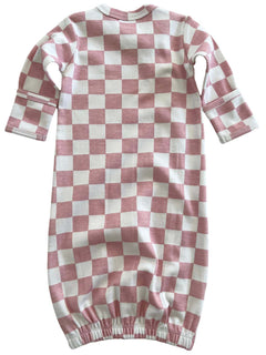 Pink and white checked baby gown with long sleeves and gathered bottom.
