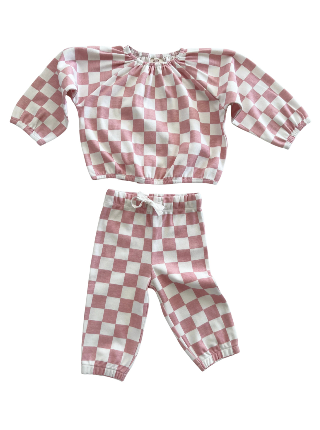 Pink and white checkered two-piece outfit with long sleeves and elastic waistband pants.