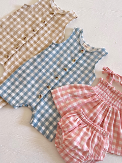Assorted children's gingham outfits: two sleeveless jumpsuits and a pink dress with matching bloomers.