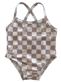 Blush and white checkered pattern one-piece swimsuit with crisscross straps. Perfect for summer fun!