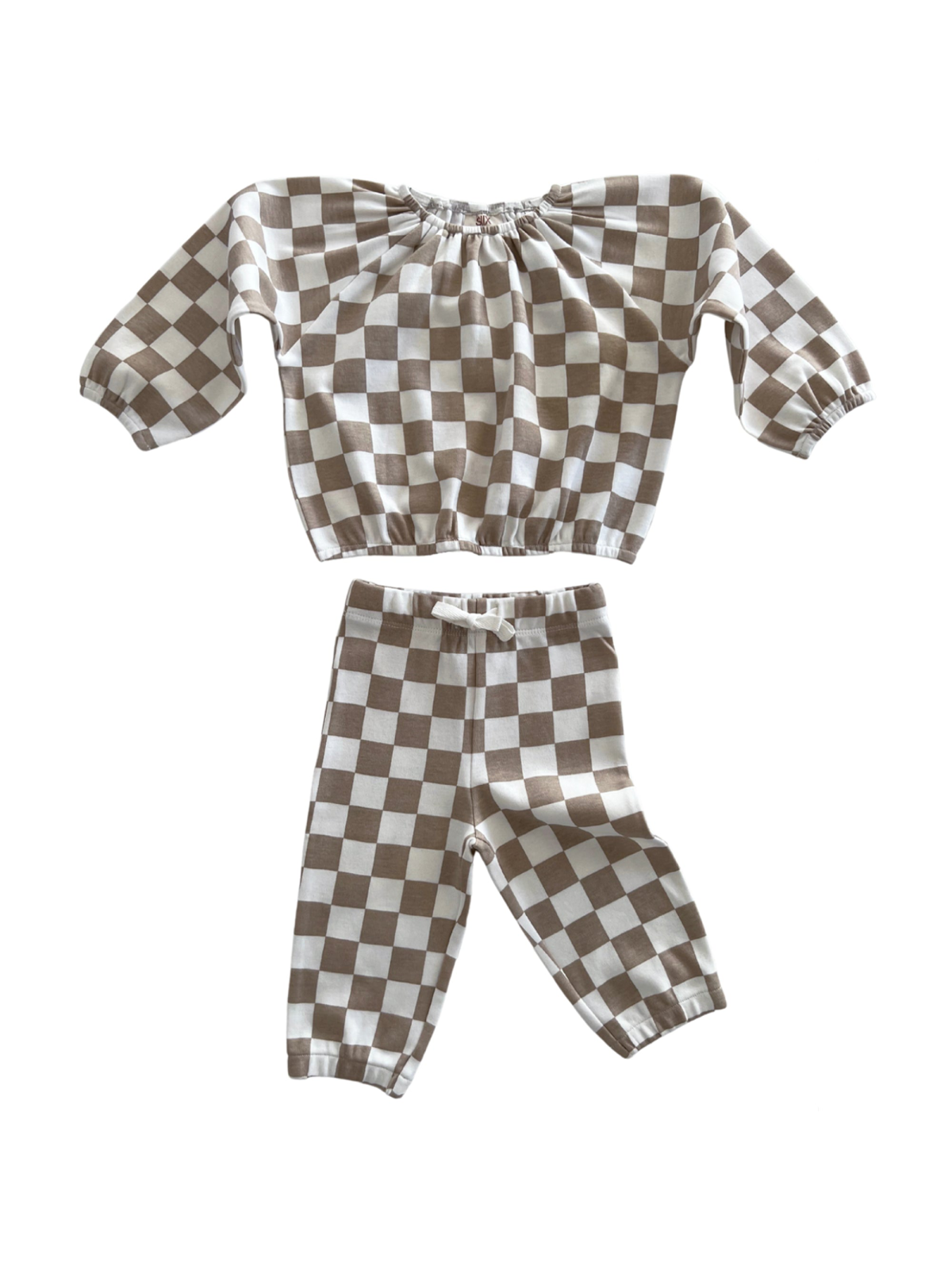 Brown and white checkered toddler outfit featuring a puff-sleeve top and matching pants.