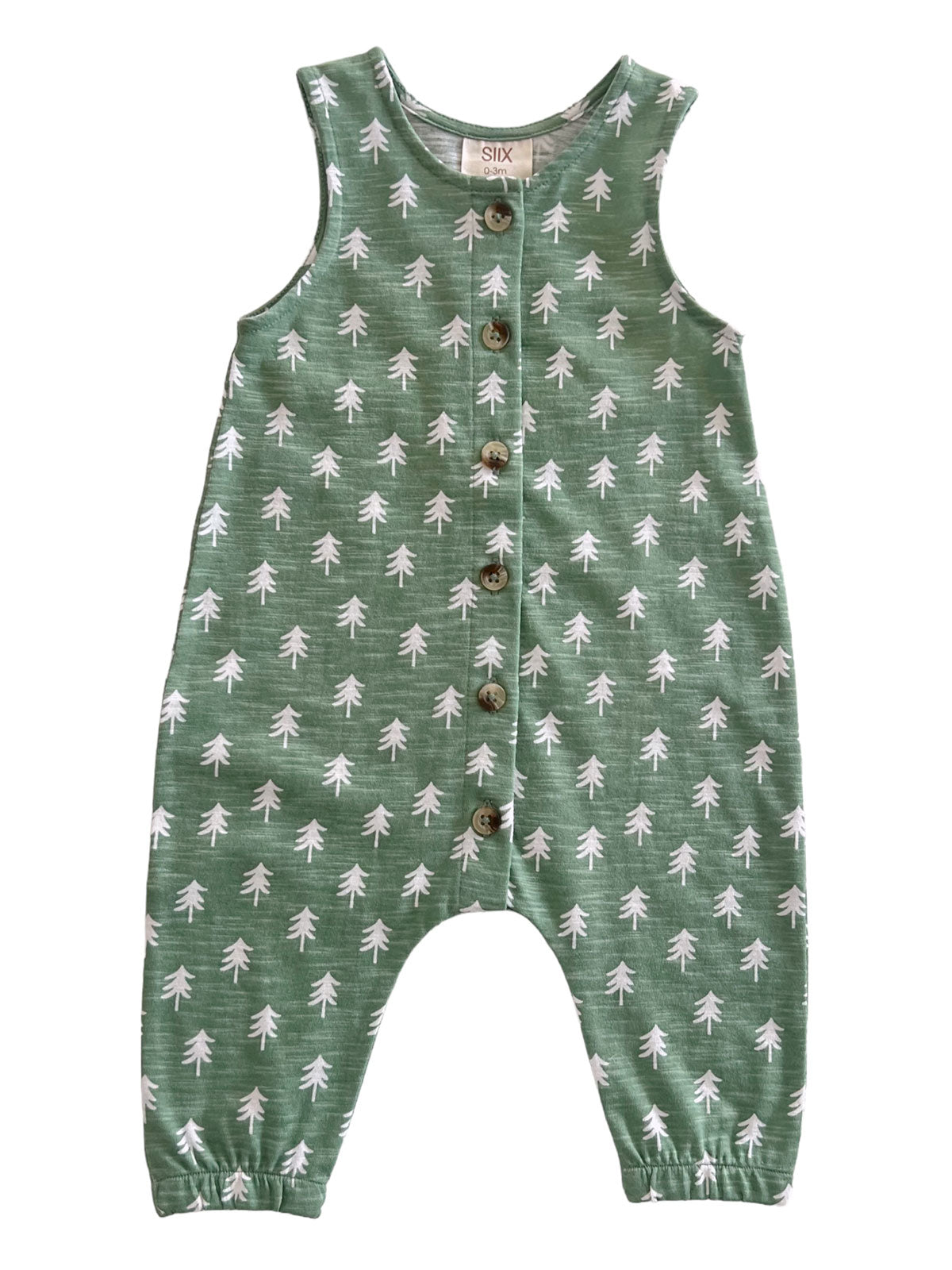 Green toddler jumpsuit with white tree patterns and buttons down the front.